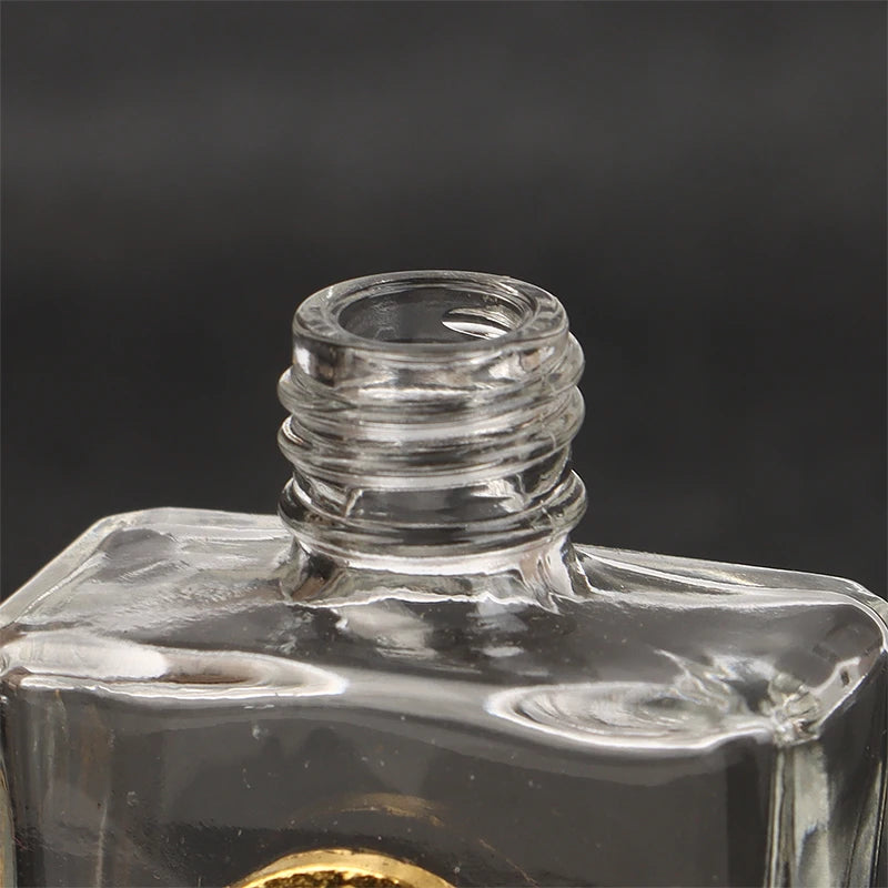 Mini Refillable Holy Water Bottle – Glass with Christian Figure & Rosette Cap – 15ml